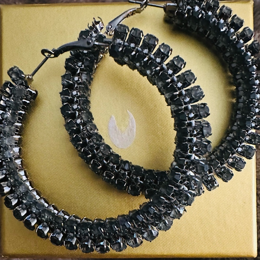 Large black hoop earrings great for any occasion, like new